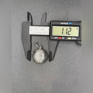 Retired Silpada Designs Silver Asian Dragon Locket.